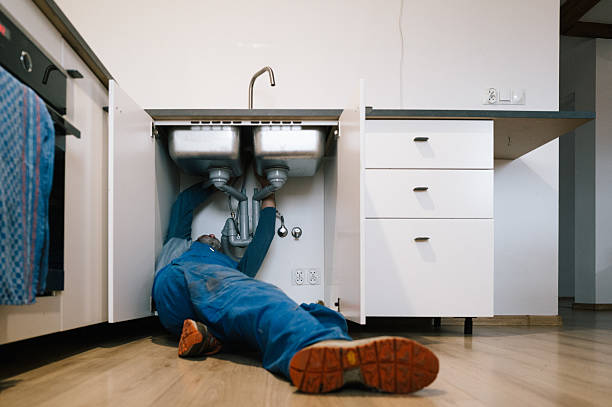 Professional Drain Cleaning technician working in Covington, IN